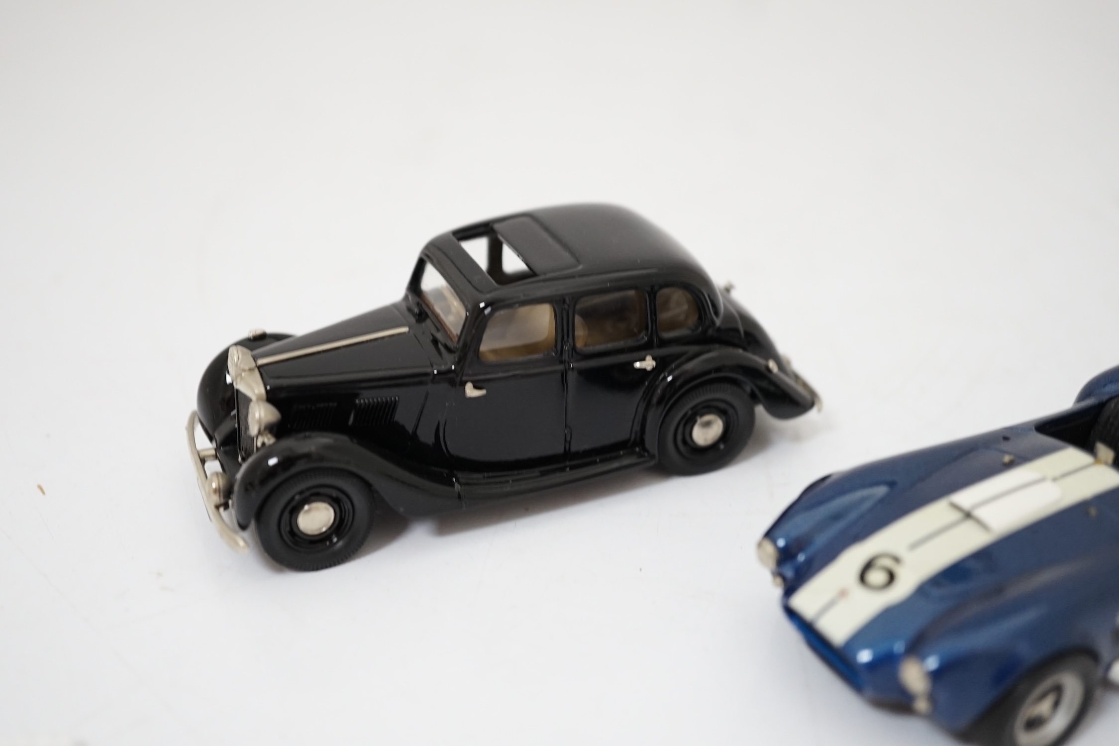 Twenty boxed diecast, white metal, etc. model vehicles including; a Lansdowne Models MG Saloon Type ‘YA’, and an unboxed S.M.T.S. white metal A.C. cobra, two Scalextric cars; a Bentley (C305) and an Alfa-Romeo (C306), th